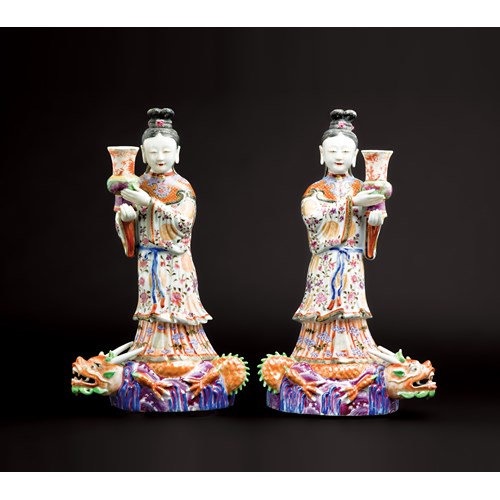 Pair of Chinese export porcelain wall mounting candlesticks modelled as maidens